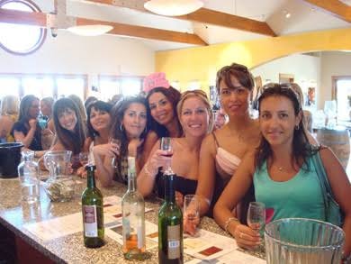 Women celebrating a birthday at a North Fork winery tasting bar